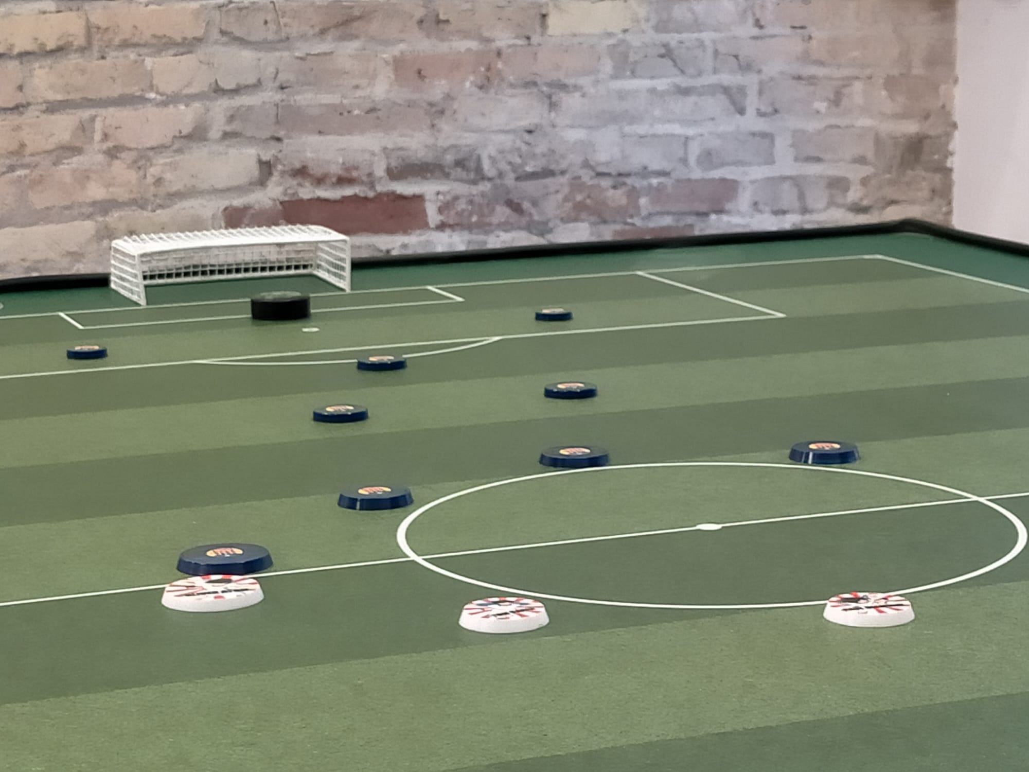 Camp de futbol botons amb botons en formació